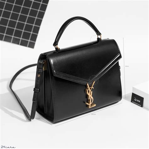 ysl cowhide cassandre bag|CASSANDRA Medium top handle bag in grain de poudre.